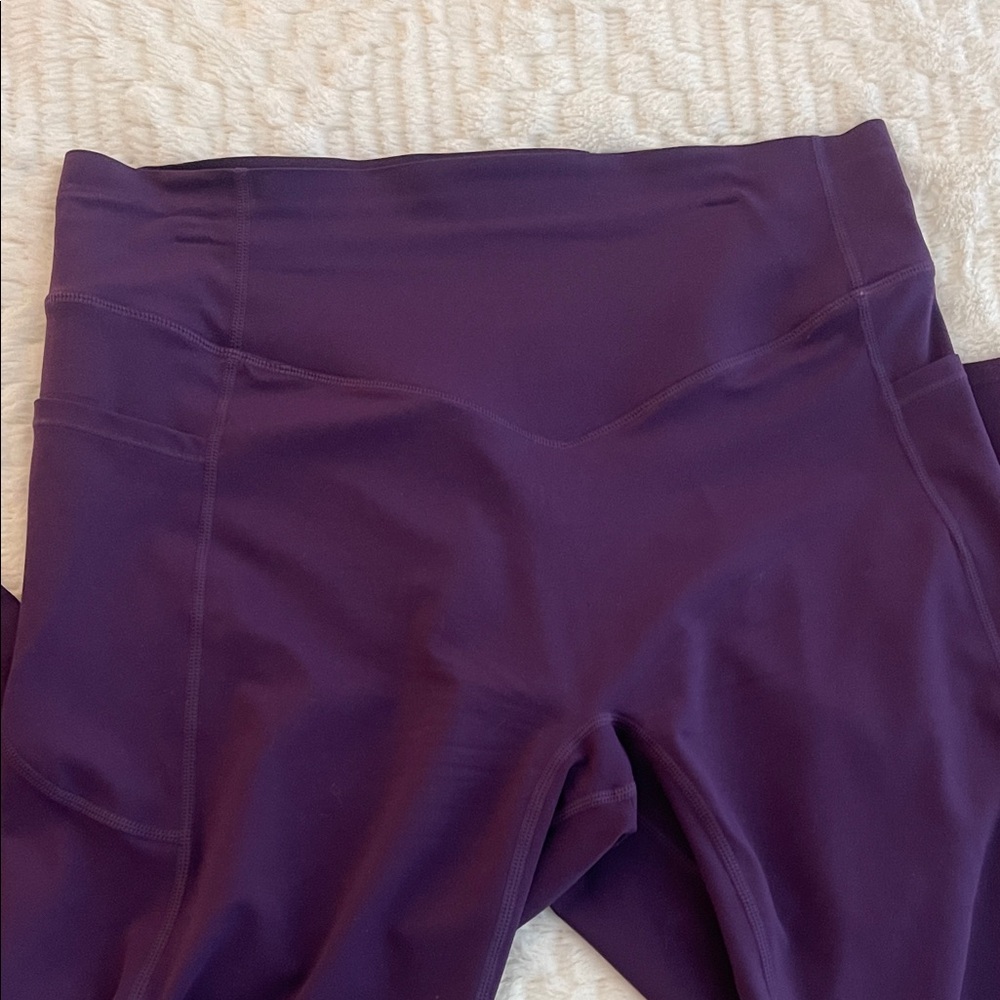 Purple XL Halara high waisted scrunch butt lifting 7/8 tummy control pockets